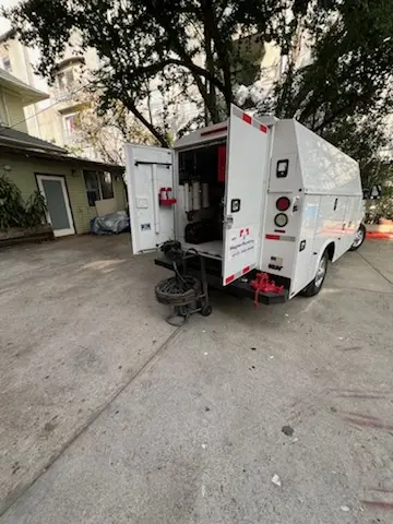 Magnet Plumbing service vehicle on-site for Grease Trap Cleaning in Little Havana